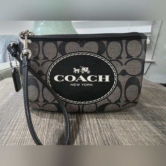 Coach Handbags - Coach Signature Large Covered Canvas Wristlet - Like New